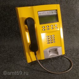 Желтый таксофон